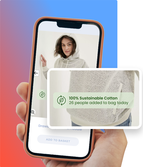 Phone graphic with a woman wearing a grey jumper with a message "100% sustainable cotton. 26 people added to bag today"